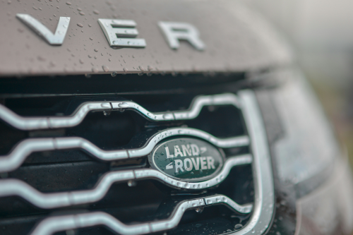Jaguar Land Rover front bumper of the car showing the logo up close