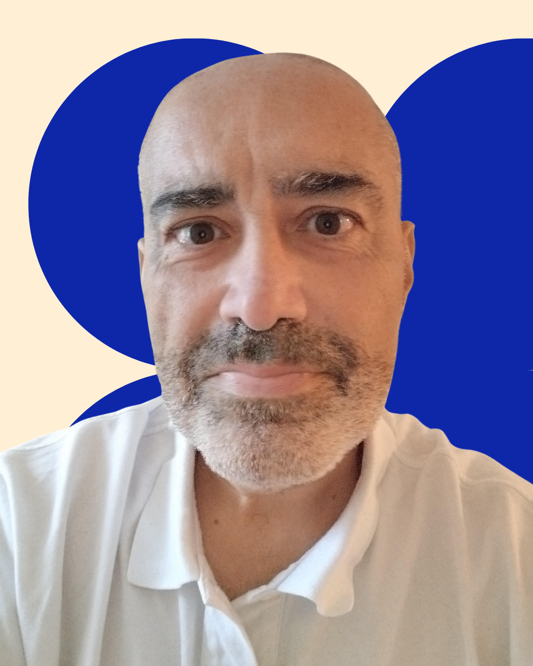 Headshot of Bill Bentaieb wearing a white polo shirt, smiling slightly.
