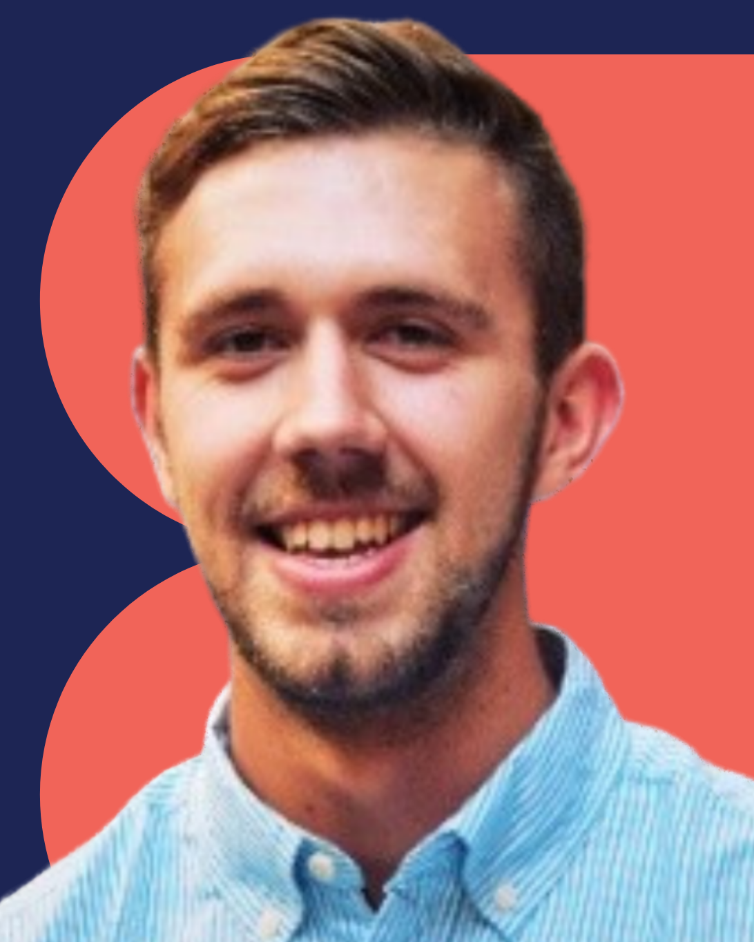 Smiling man with short light brown hair and trimmed beard, wearing a blue button-up shirt