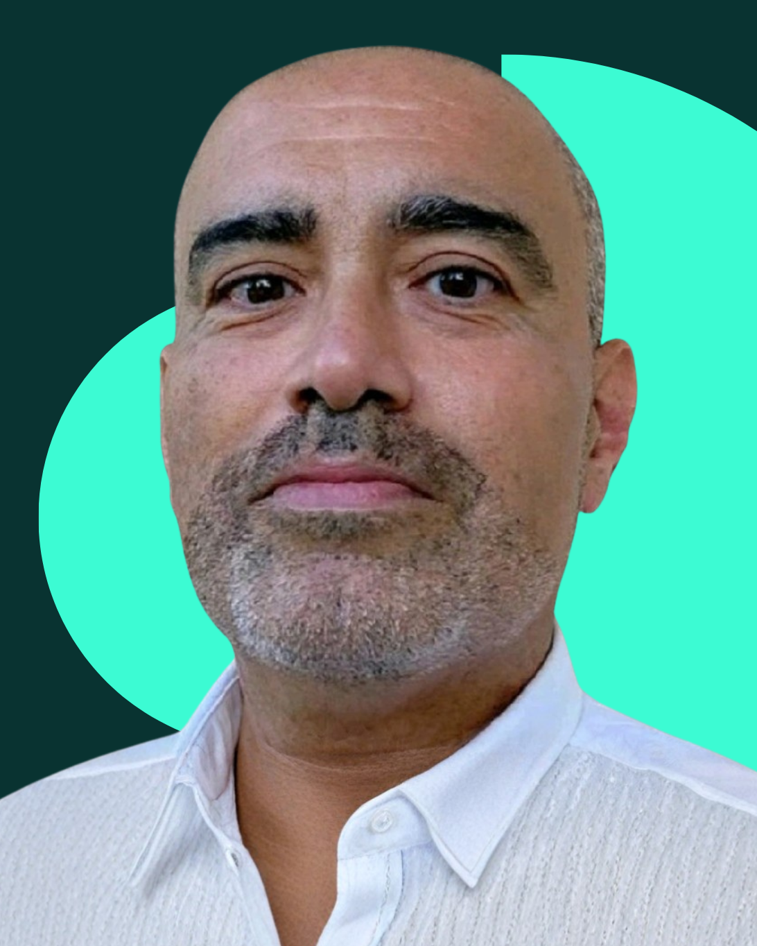 Headshot of Bill Bentaieb wearing a white button down shirt