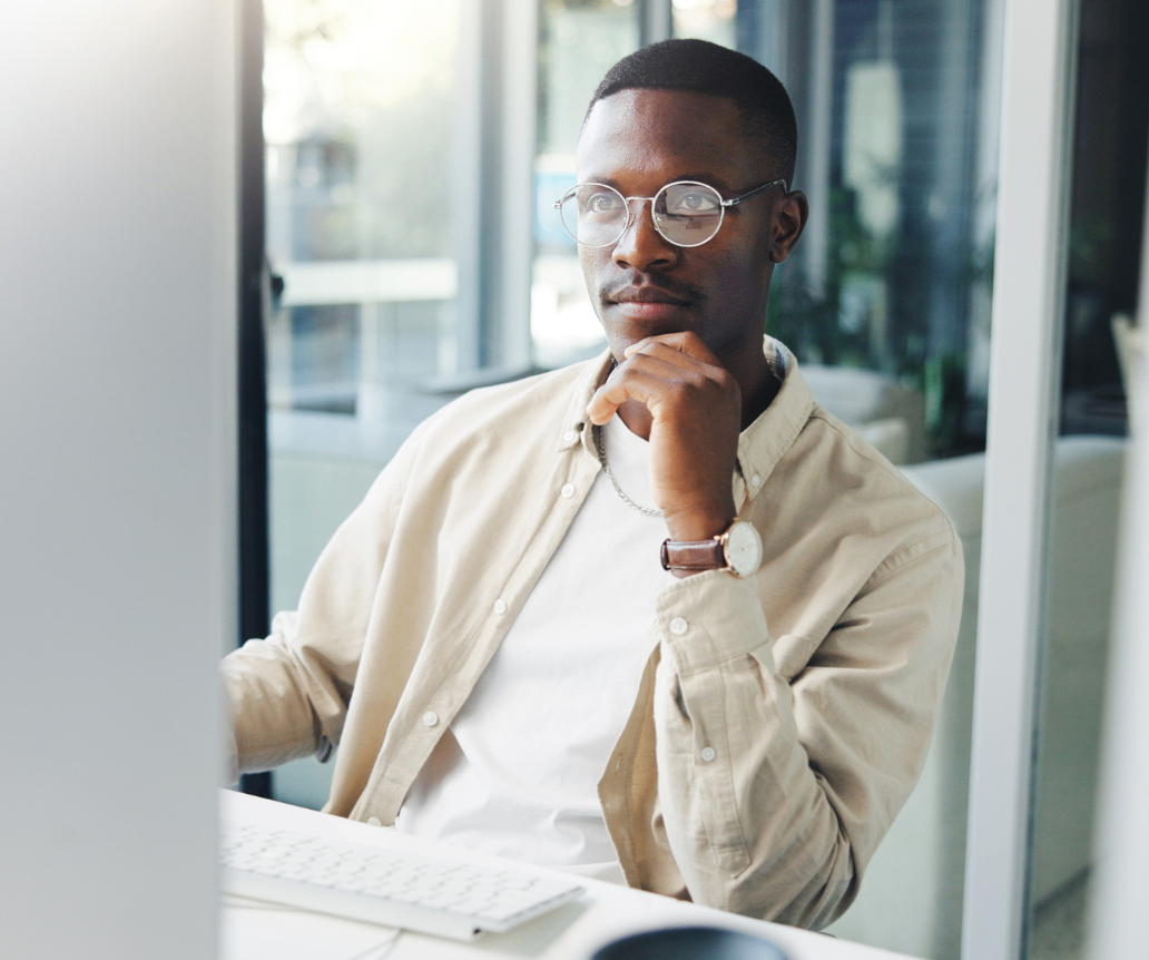 Senior designer looking at creative salary guide on computer