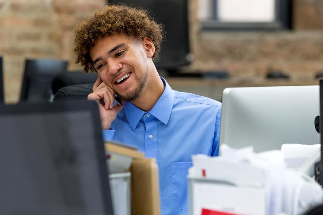 HR Assistant on a call at work