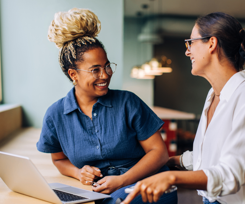 PR team on laptop looking at salary guide