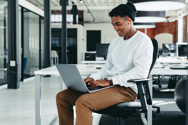 Software engineer on laptop looking at 2026 salary data