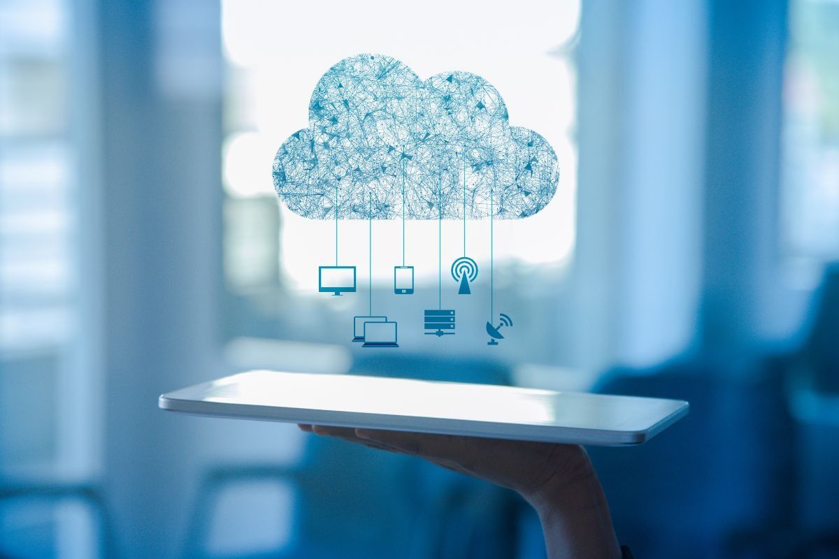 Tablet with cloud connectivity icons hovering