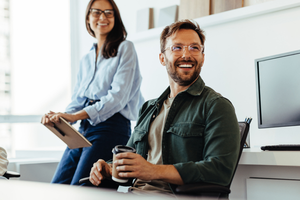 Marketing team discussing 2026 marketing salary data