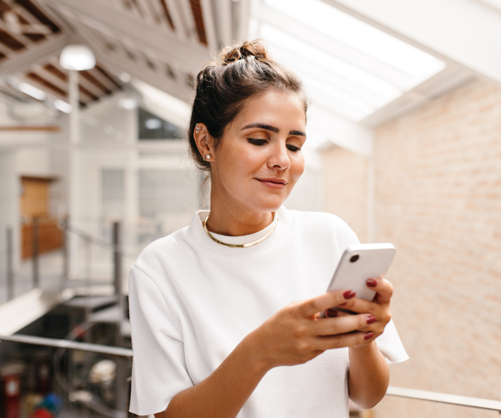 Performance marketer looking at salary guide on smart phone
