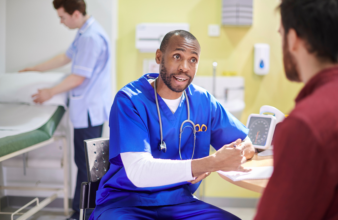 NHS nurse talking with patient