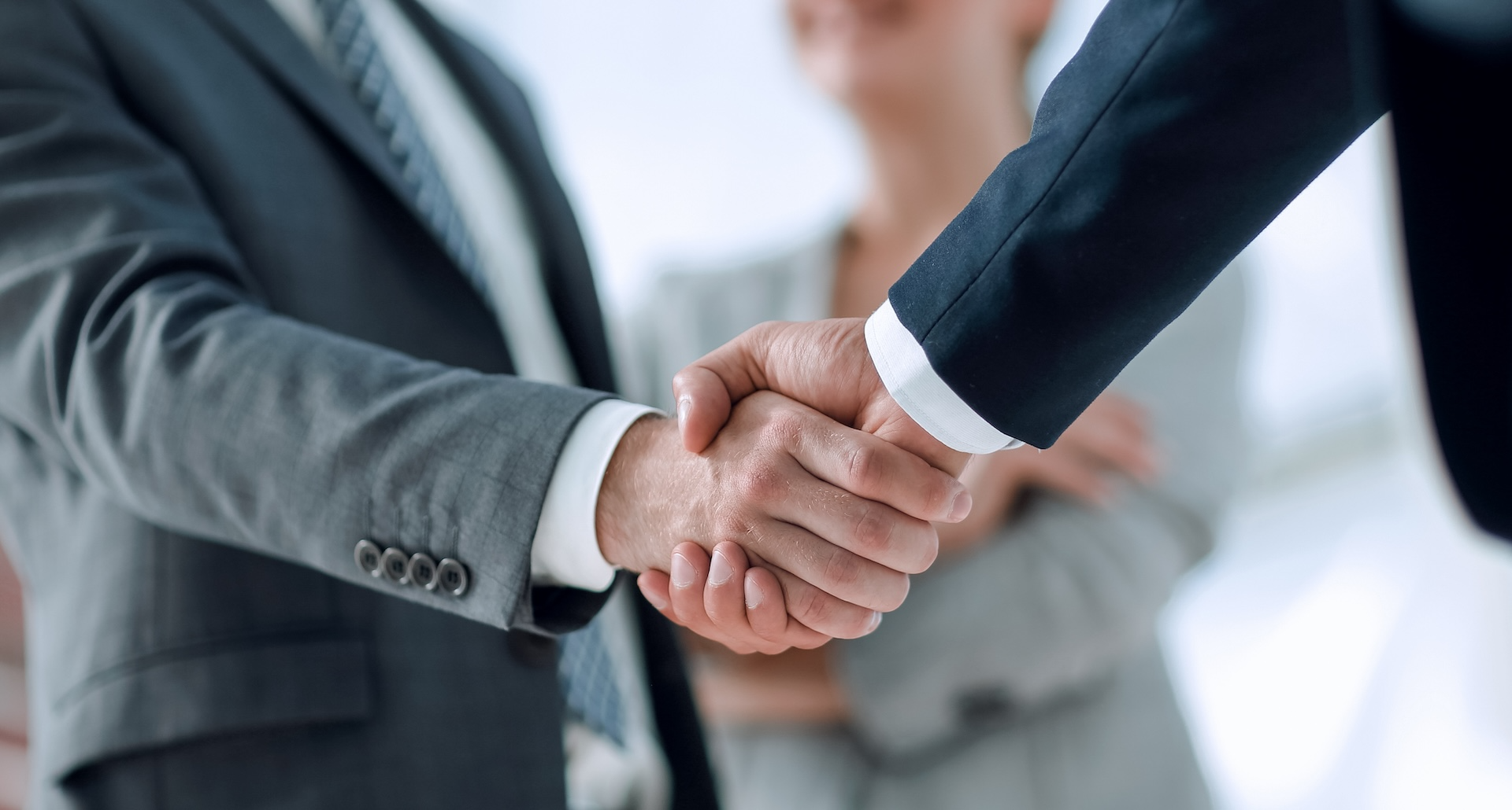 Men shaking hands.