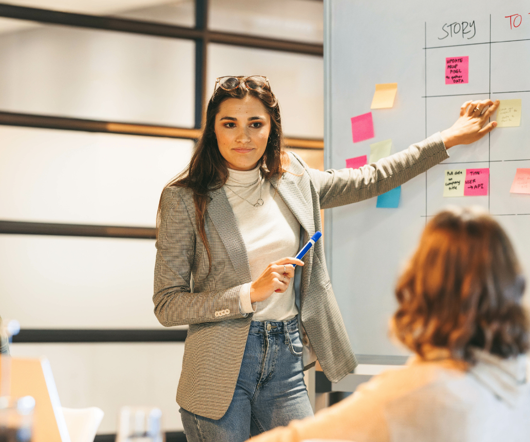 Project manager leading a scrum meeting