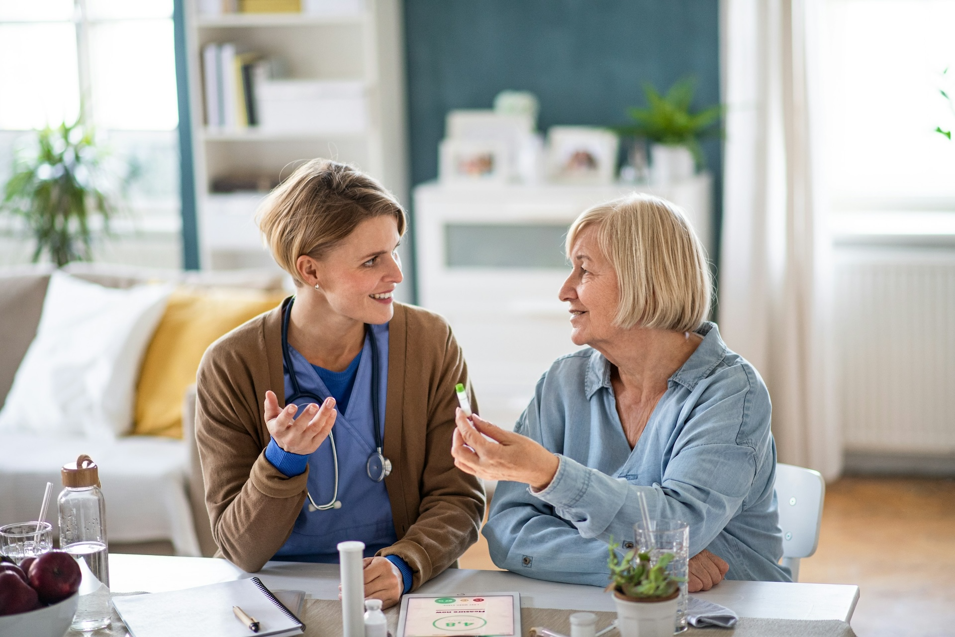 Nurse and patient talking.