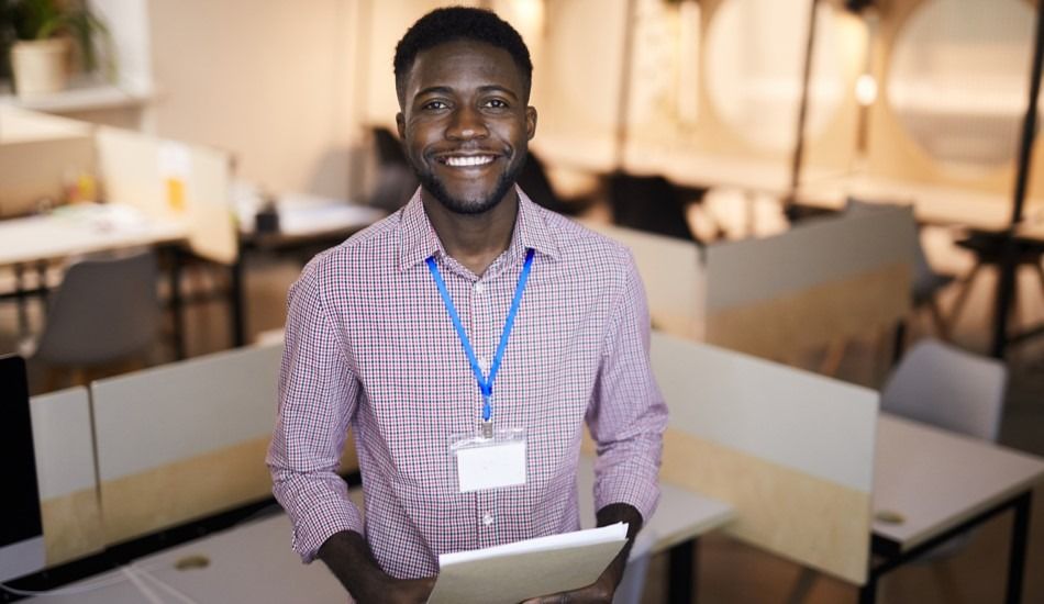 An Event Coordinator smiling at a venue 