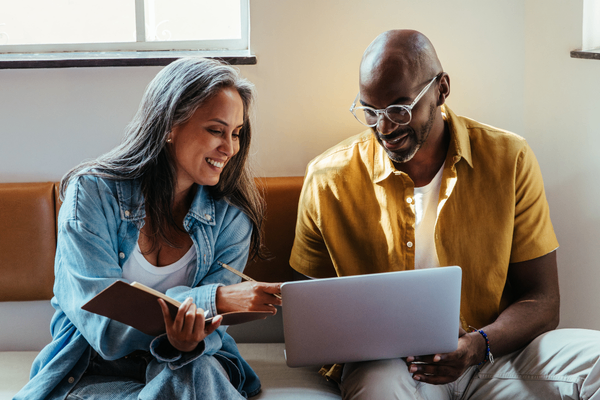 ML team discussing 2026 salary data on laptop