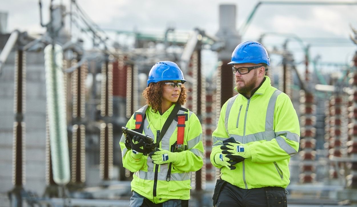 Two engineers at an outdoor site