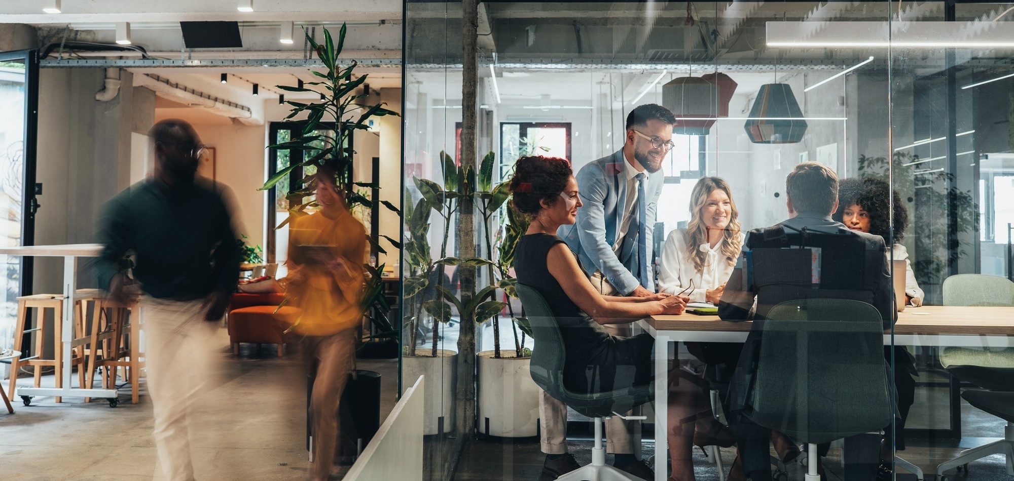 Team collaborating in a modern office meeting