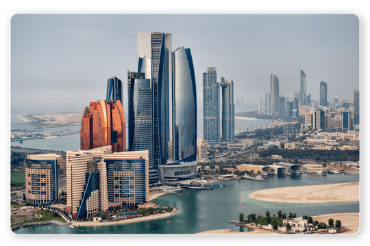 Modern skyline of Abu Dhabi featuring Etihad Towers and coastal architecture