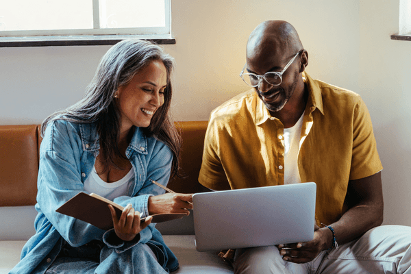 ML team discussing 2026 salary data on laptop