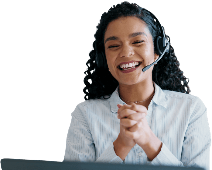 Smiling professional with headset and laptop, symbolising Medacs Healthcare’s responsive, remote staffing support.