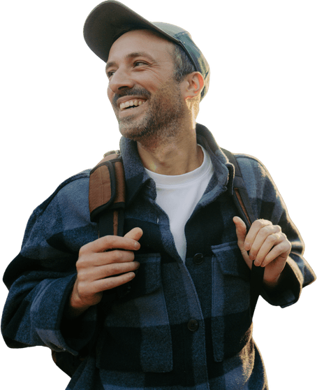 Smiling doctor with backpack, symbolising Medacs Healthcare’s commitment to flexible, fulfilling careers.