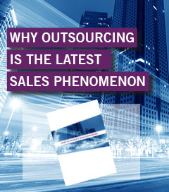 A blue-toned graphic with a motion-blurred city skyline in the background with purple blocks of text that read, "WHY OUTSOURCING IS THE LATEST SALES PHENOMENON."