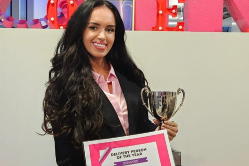 Andreea Bobilca winning Delivery Consultant of the Year Award