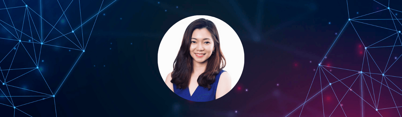 A woman dressed in blue is set against a white backdrop, highlighting the seamless blend of colours in the composition.