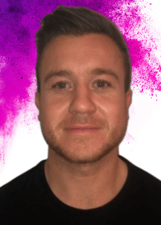 Man smiling with purple splash behind him
