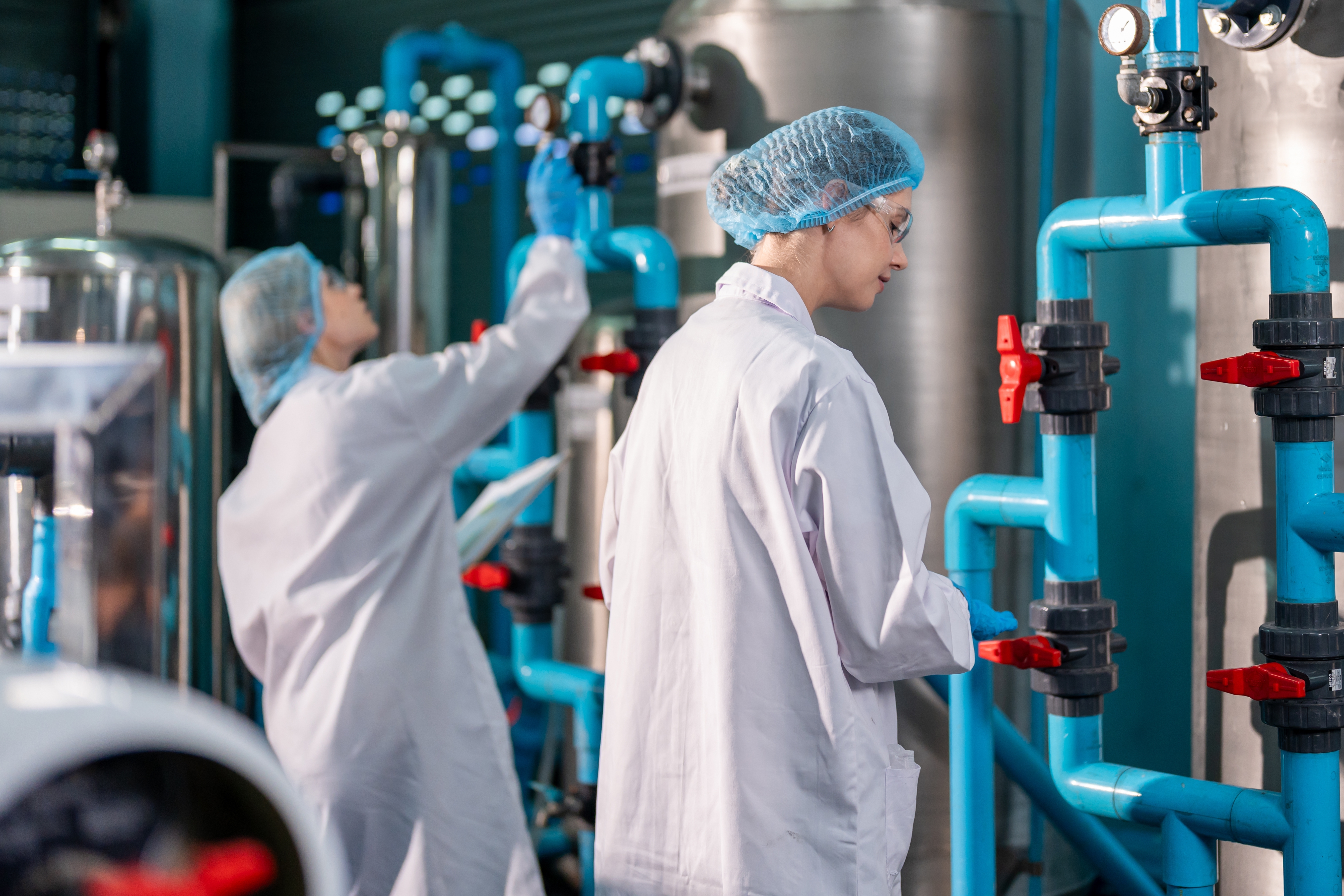 Chemicals industry professionals in a production environment